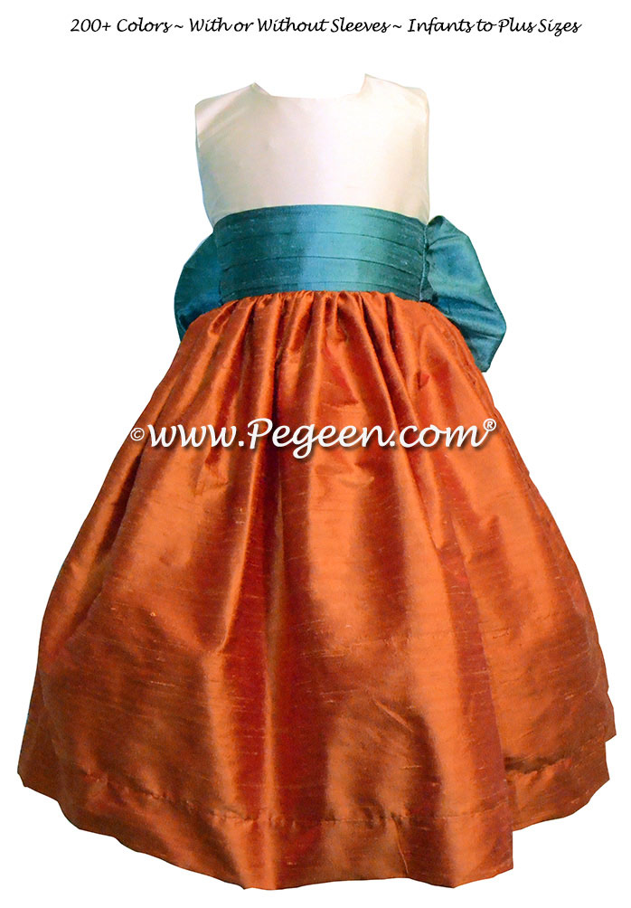 Pumpkin Orange, New ivory and Teal flower girl dresses by Pegeen