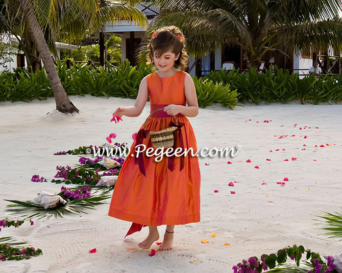 Flower girl dresses in Mango Orange and Raspberry Pink
