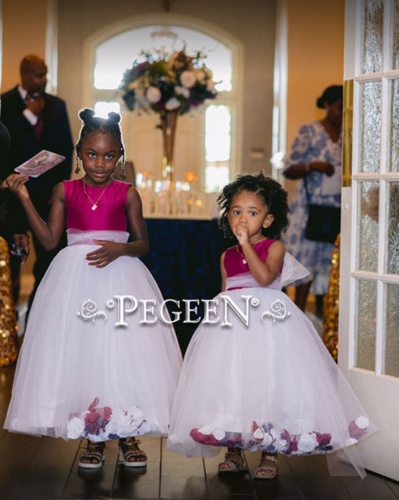 Cranberry flower girl dresses with ivory tulle bottom, filled with flowers